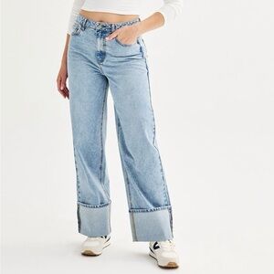 High rise wide leg cuffed jeans. Medium wash